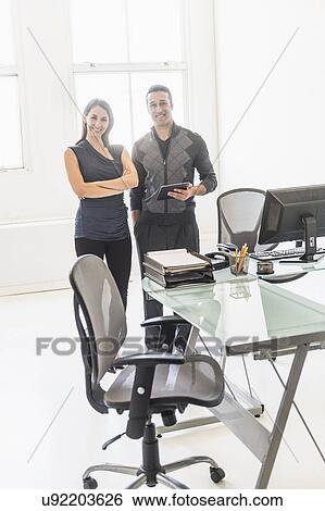 Business people in office View Large Photo Image Stock Photograph - Business people in office. Fotosearch