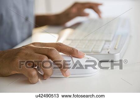 Close up of woman working on computer View Large Photo Image Stock Image - Close up of woman working on computer. Fotosearch