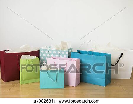 Stock Image - Colorful shopping bags, studio shot. Fotosearch