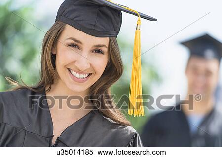 Female and male student on graduation ceremony View Large Photo Image Stock Photography - Female and male student on graduation ceremony. Fotosearch