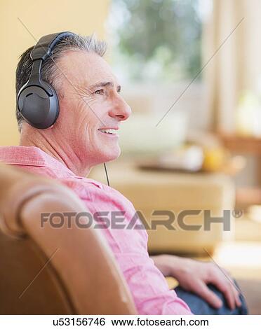 Man with headphones View Large Photo Image Stock Photograph - Man with headphones. Fotosearch