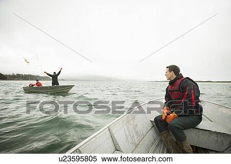 Stock Photography - People crabbing. Fotosearch