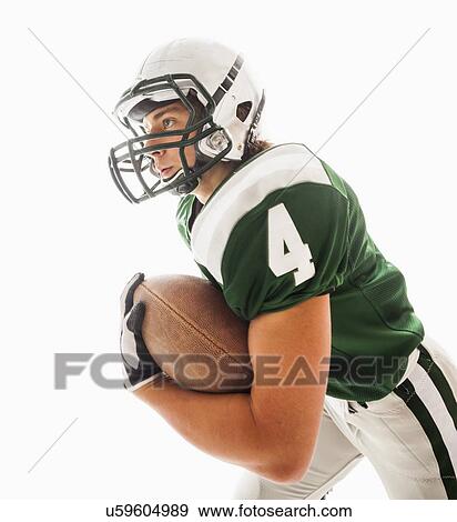 Stock Photo - Portrait of American football player . Fotosearch