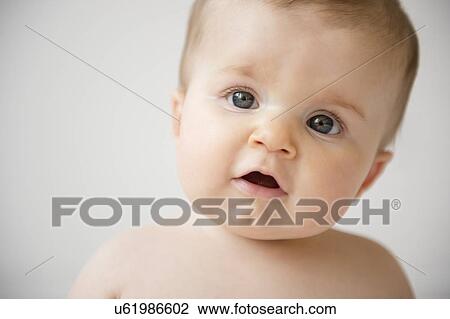 Portrait of baby girl (6-11 months) View Large Photo Image Stock Image - Portrait of baby girl (6-11 months). Fotosearch