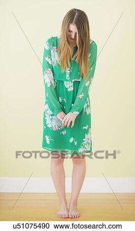 Stock Image - Portrait of barefoot woman. Fotosearch