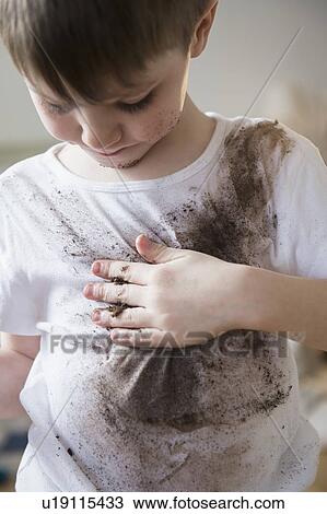 Portrait of boy (4-5) in dirty t-shirt View Large Photo Image Stock Image - Portrait of boy (4-5) in dirty t-shirt. Fotosearch
