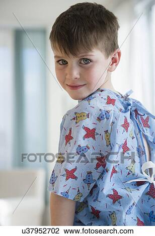 Portrait of boy (4-5) in surgical gown View Large Photo Image Stock Image - Portrait of boy (4-5) in surgical gown. Fotosearch