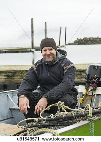 Portrait of man in boat View Large Photo Image Stock Image - Portrait of man in boat. Fotosearch