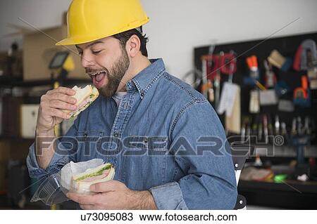 Portrait of manual worker taking break View Large Photo Image Stock Image - Portrait of manual worker taking break. Fotosearch