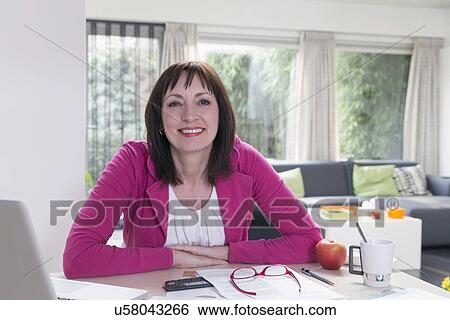 Stock Photograph - Portrait of mature businesswoman. Fotosearch