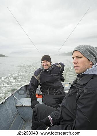 Portrait of men in boat View Large Photo Image Stock Image - Portrait of men in boat. Fotosearch