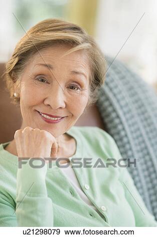 Stock Photo - Portrait of senior woman at home. Fotosearch