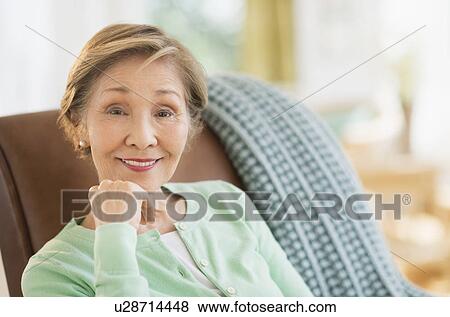 Stock Photo - Portrait of senior woman at home. Fotosearch