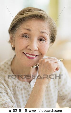 Stock Photography - Portrait of senior woman smiling. Fotosearch