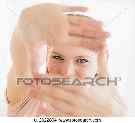 Portrait of smiling and gesturing woman View Large Photo Image Picture - Portrait of smiling and gesturing woman. Fotosearch