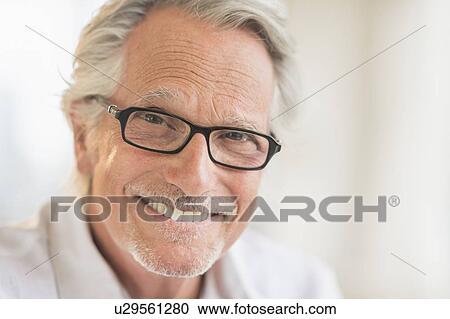 Portrait of smiling senior man View Large Photo Image Stock Image - Portrait of smiling senior man. Fotosearch