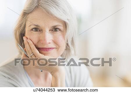 Portrait of smiling senior woman View Large Photo Image Stock Image - Portrait of smiling senior woman. Fotosearch