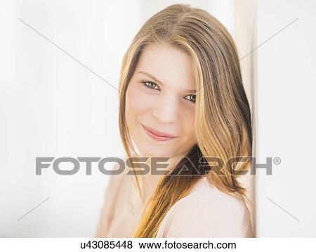 Stock Photo - Portrait of smiling woman. Fotosearch
