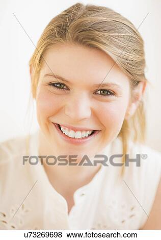 Stock Photo - Portrait of smiling woman. Fotosearch