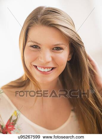 Stock Photo - Portrait of smiling woman. Fotosearch