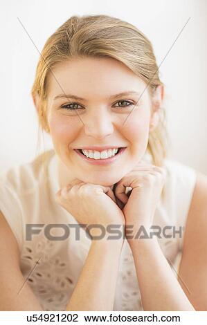Portrait of young cheerful woman View Large Photo Image Stock Image - Portrait of young cheerful woman. Fotosearch