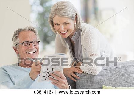 Senior couple doing crossword View Large Photo Image Stock Image - Senior couple doing crossword. Fotosearch