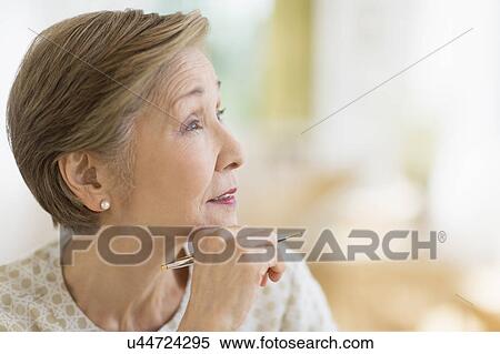 Senior woman thinking View Large Photo Image Stock Photography - Senior woman thinking. Fotosearch