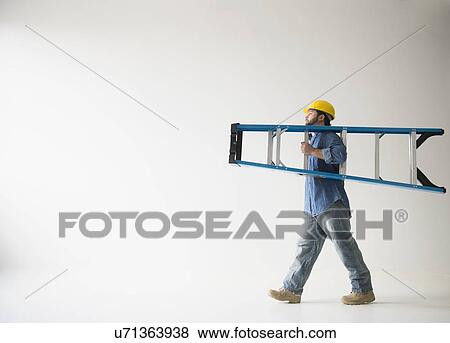 Side view of man carrying ladder View Large Photo Image Stock Photo - Side view of man carrying ladder. Fotosearch