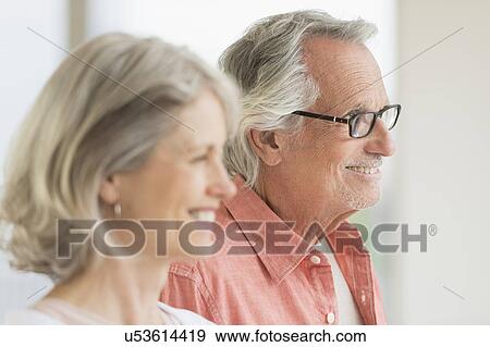 Smiling senior couple View Large Photo Image Stock Photo - Smiling senior couple. Fotosearch