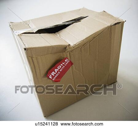 Studio Shot of damaged box with fragile label View Large Photo Image Stock Photo - Studio Shot of damaged box with fragile label. Fotosearch