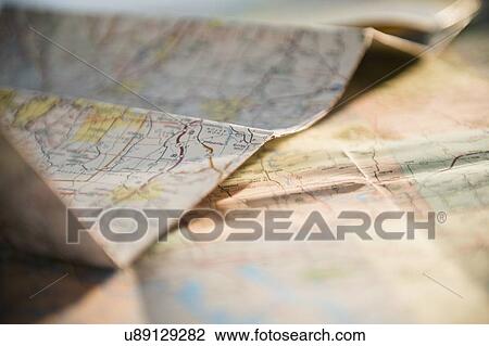 Stock Image - Studio Shot of maps . Fotosearch