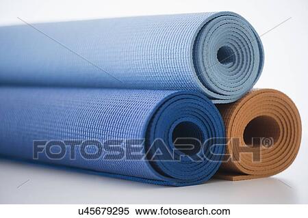 Studio Shot of rolled up exercise mats View Large Photo Image Stock Photography - Studio Shot of rolled up exercise mats. Fotosearch