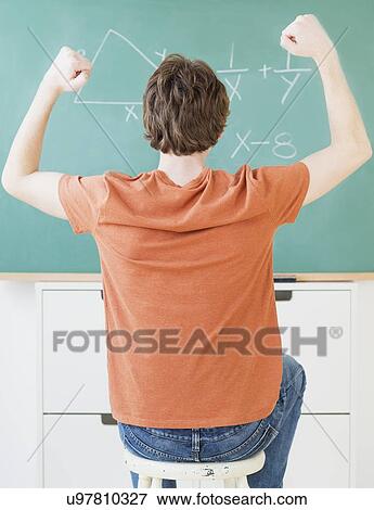 Teenage boy (14-15) in classroom View Large Photo Image Stock Photo - Teenage boy (14-15) in classroom. Fotosearch