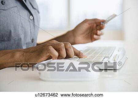 Woman doing internet shopping View Large Photo Image Stock Image - Woman doing internet shopping. Fotosearch