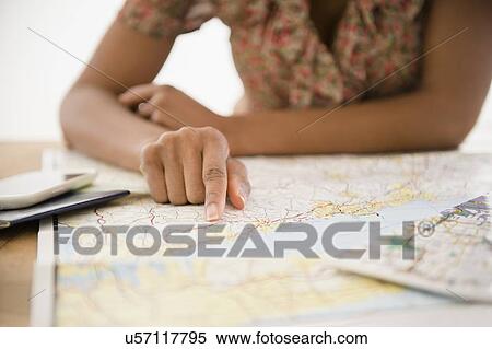 Woman planning trip View Large Photo Image Stock Photography - Woman planning trip. Fotosearch