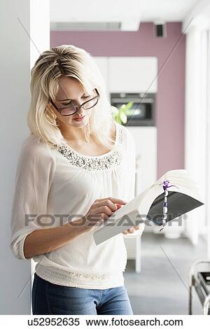 Stock Photography - Woman reading book. Fotosearch