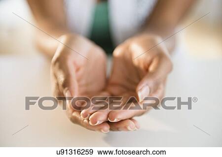 Woman's hands cupped View Large Photo Image Stock Photo - Woman's hands cupped. Fotosearch