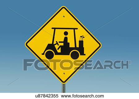 Stock Photography - Yellow road sign depicting golf cart. Fotosearch