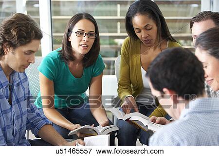 Stock Photo - Bible Group Reading Together. Fotosearch