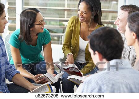 Stock Photo - Bible Group Reading Together. Fotosearch