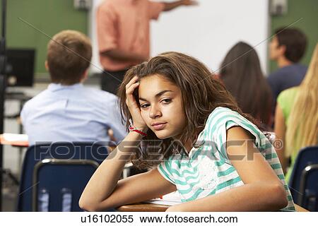 Bored Female Teenage Pupil In Classroom View Large Photo Image Stock Photography - Bored Female Teenage Pupil In Classroom. Fotosearch