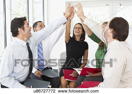 Business Team Giving One Another High Five View Large Photo Image Stock Image - Business Team Giving One Another High Five. Fotosearch