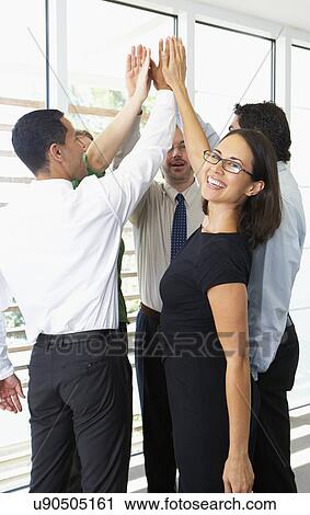 Business Team Giving One Another High Five View Large Photo Image Stock Image - Business Team Giving One Another High Five. Fotosearch