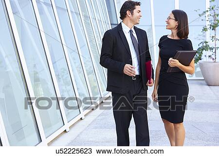Businessman And Businesswomen Walking Outside Office View Large Photo Image Stock Image - Businessman And Businesswomen Walking Outside Office. Fotosearch