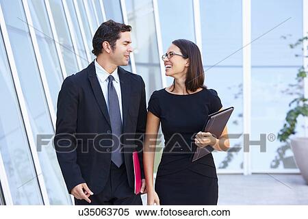 Businessman And Businesswomen Walking Outside Office View Large Photo Image Stock Photography - Businessman And Businesswomen Walking Outside Office. Fotosearch