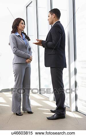 Businesspeople Having Informal Meeting In Office View Large Photo Image Stock Photography - Businesspeople Having Informal Meeting In Office. Fotosearch