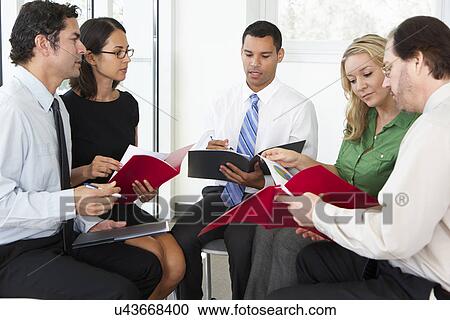 Businesspeople Having Informal Office Meeting View Large Photo Image Stock Image - Businesspeople Having Informal Office Meeting. Fotosearch