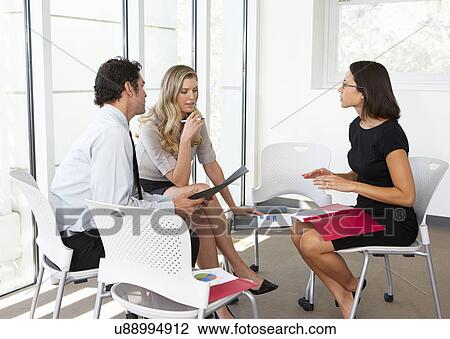 Businesspeople Having Informal Office Meeting View Large Photo Image Stock Image - Businesspeople Having Informal Office Meeting. Fotosearch
