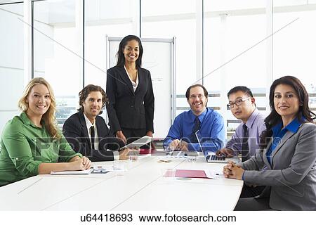 Businesswoman Conducting Meeting In Boardroom View Large Photo Image Stock Image - Businesswoman Conducting Meeting In Boardroom. Fotosearch