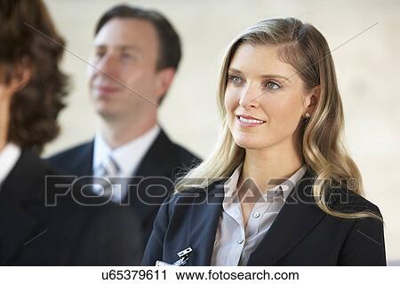 Businesswoman Listening To Speaker At Conference View Large Photo Image Stock Image - Businesswoman Listening To Speaker At Conference. Fotosearch